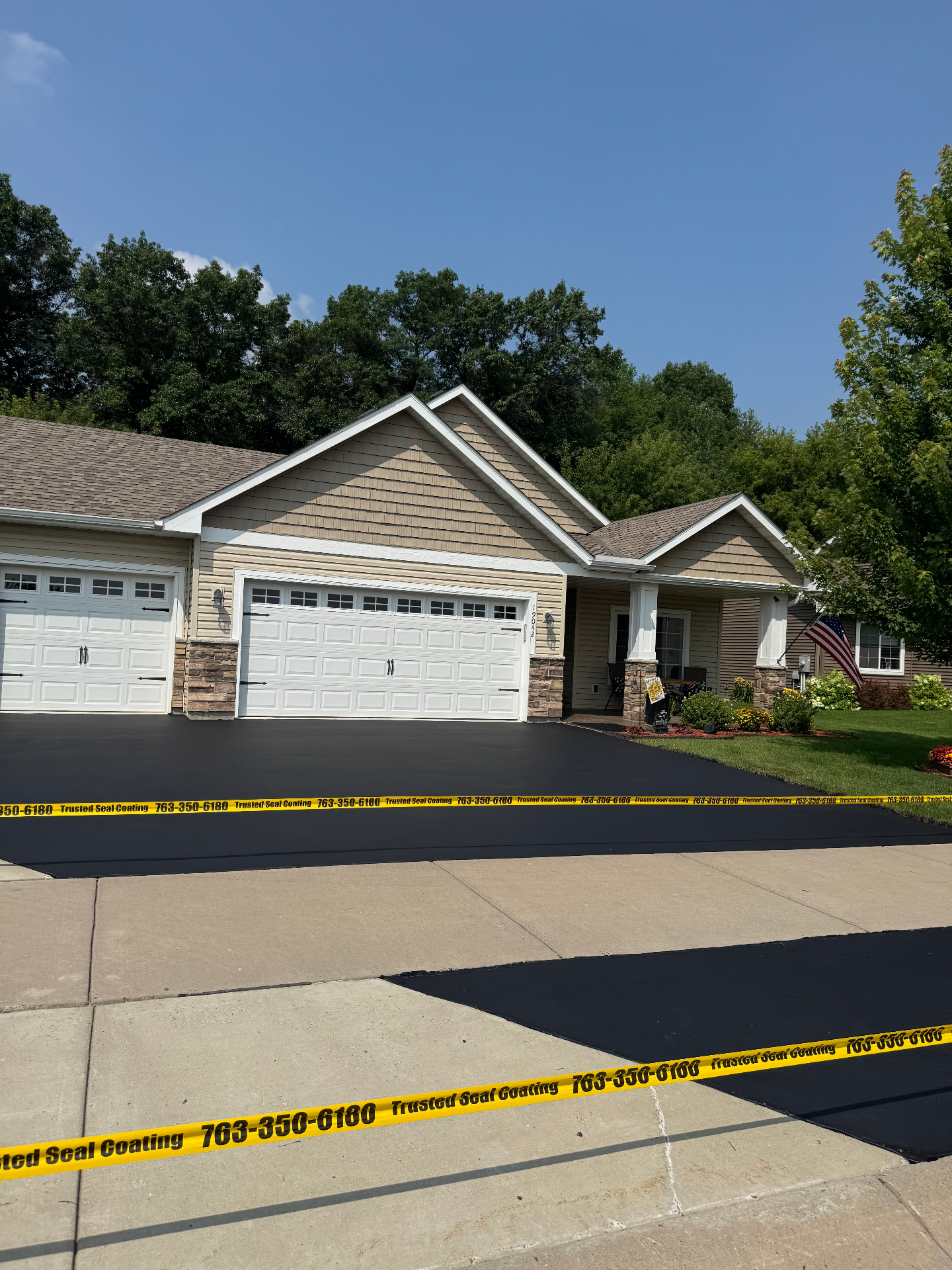 Freshly seal coated residential driveway